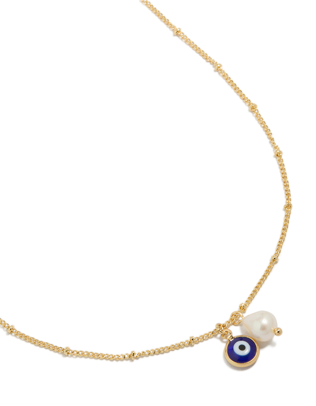 Showcasing a gold plated brass pearl and evil eye pendant necklace with beaded chain and charm details in gold close up view