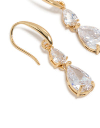 Detailed view of gold plated cubic zirconia triangular drop hook earrings showcasing craftsmanship close up view - link has visual effect only