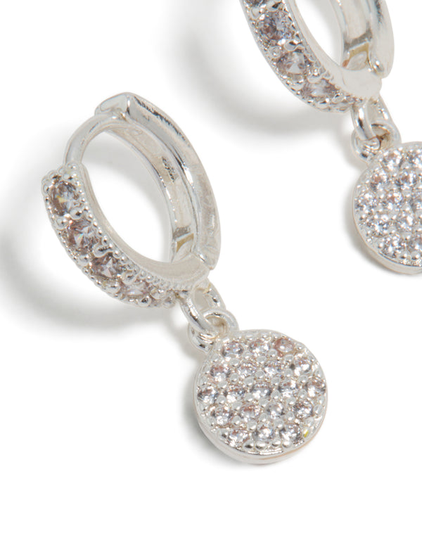 Showcasing silver plated cubic zirconia pavé circle drop earrings close up view