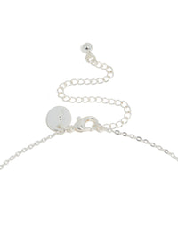 Showcasing silver plated cubic zirconia dainty vine spaced necklace clasp detail view - link has visual effect only