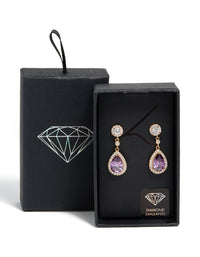 Featuring gold purple cubic zirconia double drop earrings front view - link has visual effect only