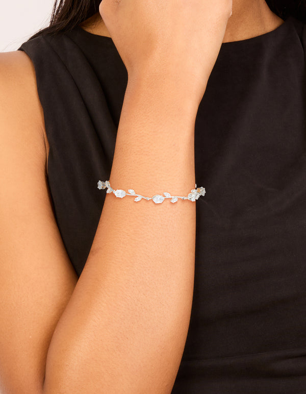 Elegantly designed dainty vine bracelet with cubic zirconia stones in silver and clear on wrist view