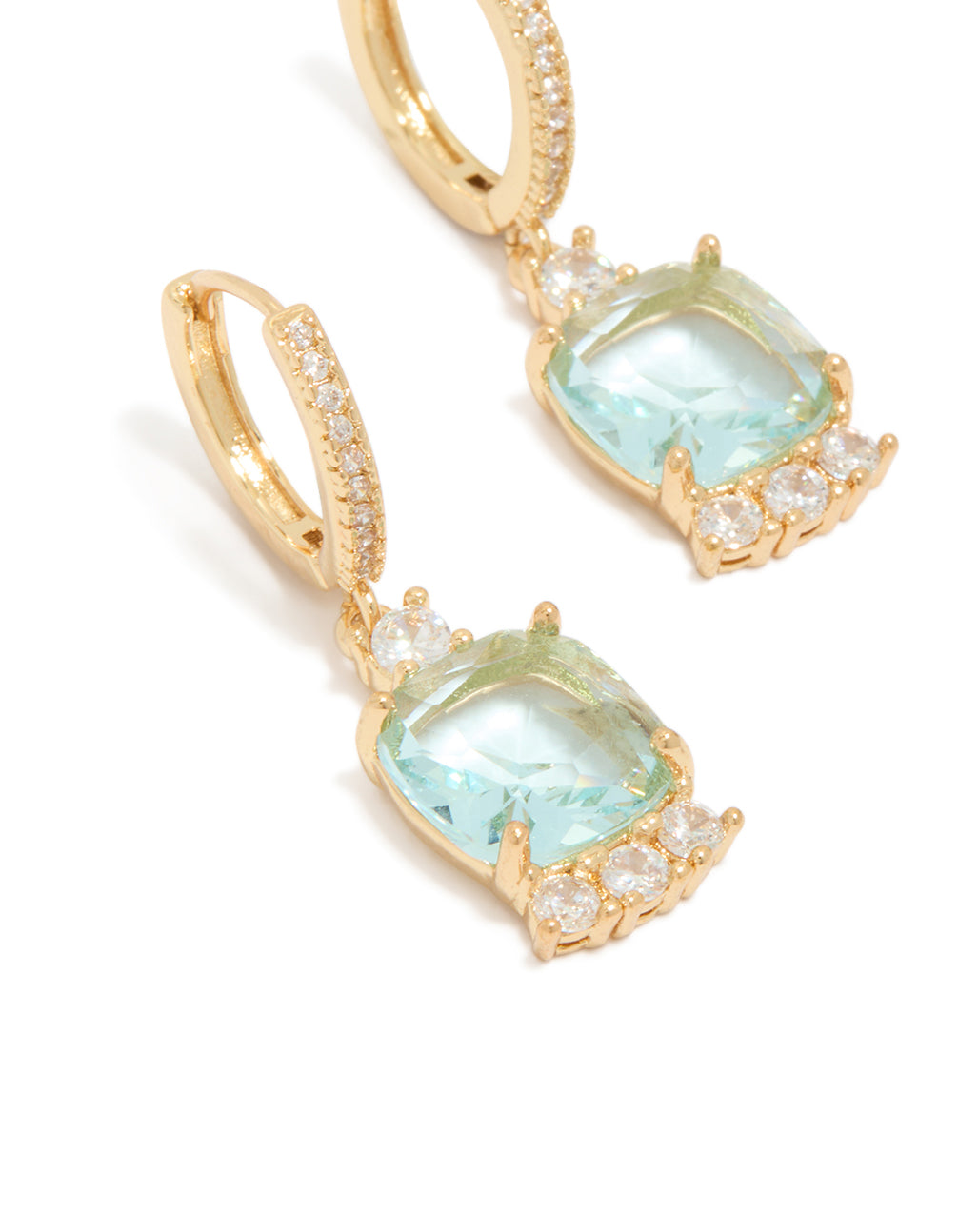 Beautifully crafted gold plated blue square cubic zirconia huggie earrings in aqua and clear stone close up view