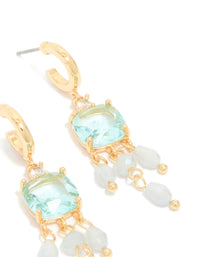 Presenting gold plated blue cubic zirconia square drop earrings with stone and bead details, accented with charms in a statement style, post detail view - link has visual effect only