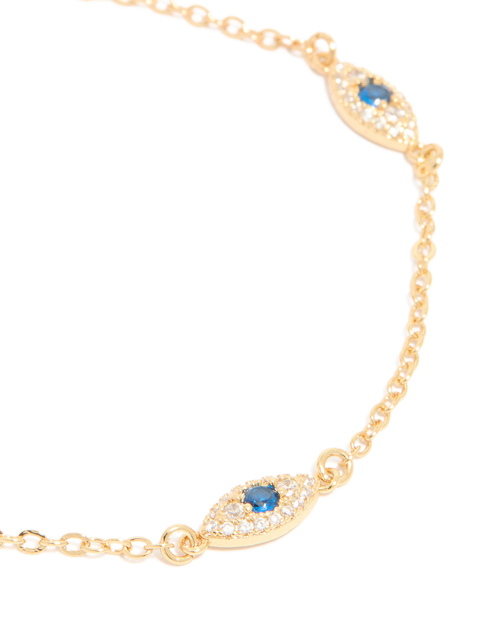Featuring gold plated cubic zirconia evil eye trio bracelet, close up view