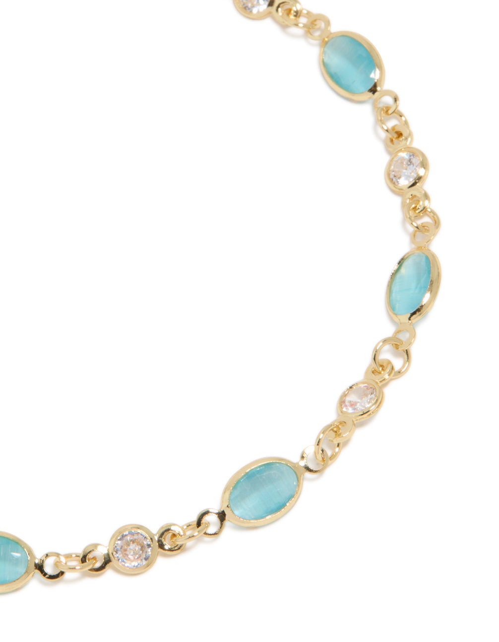 Elegant gold plated blue and clear cubic zirconia in oval bracelet close up view