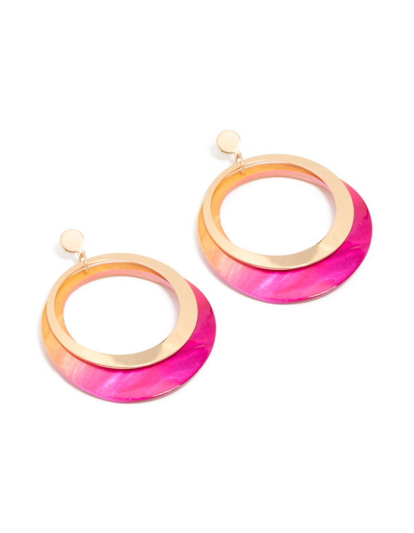 Showcasing gold two tone pink shell open disc drop earrings in a front view