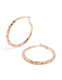 Showcasing large thin hoop statement earrings crafted from enamel with dotted pattern in gold, pink, and coral front view - link has visual effect only