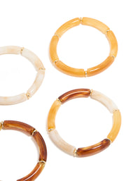 Crafted with bead detailing, these gold brown and orange acrylic stretch bracelets offer a close up view - link has visual effect only