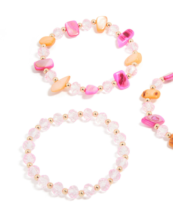 Featuring beaded stretch bracelets in a 3-pack with hot pink peachpuff lightpink and gold tones close up view