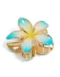 Showcasing a floral enamel frangipani flower claw clip in turquoise, yellow, and gold front view - link has visual effect only