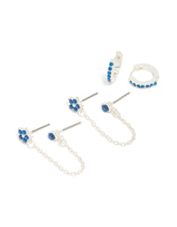 Showcasing silver blue cubic zirconia chain flower and huggie earrings in a 3-pack with floral design front view - link has visual effect only