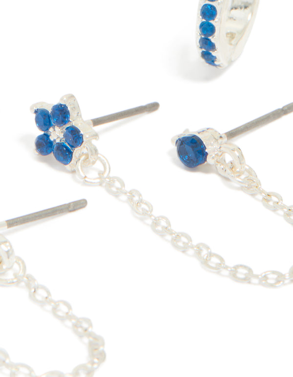 Crafted from silver blue cubic zirconia chain flower and huggie earrings 3-pack with floral elements close up view
