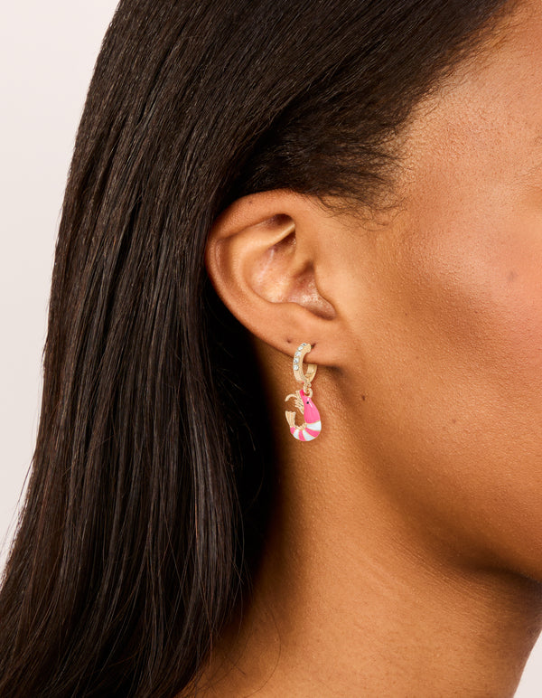 Showcasing gold diamante shrimp open huggie earrings featuring with ocean-inspired design in hot pink and white on ear view
