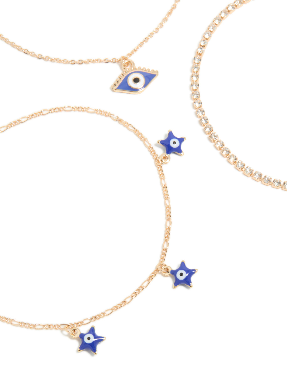Crafted from cubic zirconia, gold evil eye tennis and chain anklets 3-pack with celestial star charms detail view