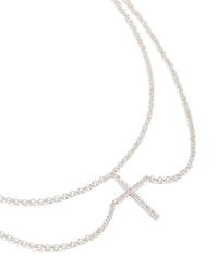 Showcasing a silver plated layered necklace with cubic zirconia cross pendant front view - link has visual effect only