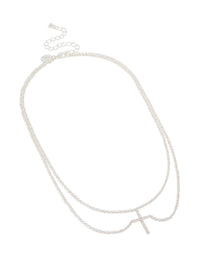 Featuring a silver plated layered necklace with cubic zirconia cross pendant close up view - link has visual effect only