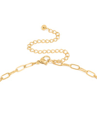 Highlighting the waterproof gold plated stainless steel oversized shell pendant necklace in ivory accent clasp detail view - link has visual effect only