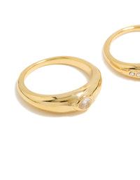 Featuring waterproof gold plated stainless steel with bezel set cubic zirconia and crystal accents in a statement 2-pack close up view - link has visual effect only