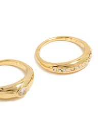 Featuring waterproof gold plated stainless steel with bezel set cubic zirconia and crystal accents in a statement 2-pack close up view - link has visual effect only