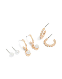Showcasing dainty gold pearl and diamante huggie earrings in a 3-pack with stud closure front view - link has visual effect only