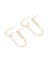 Showcasing gold huggie and chain stud earrings featuring stud and huggie closure front view - link has visual effect only