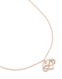 Showcasing a rose gold diamante open heart infinity necklace close up view - link has visual effect only