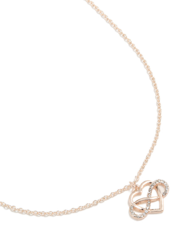 Showcasing a rose gold diamante open heart infinity necklace close up view