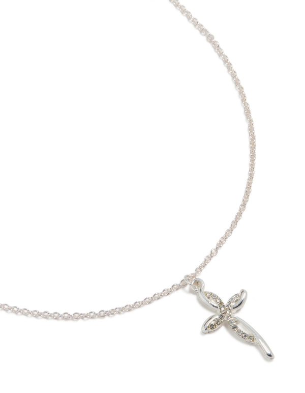 Showcasing a silver diamante twist cross pendant necklace with statement styling in close up view