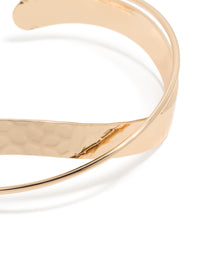 Featuring a gold twisted wrist cuff close up view - link has visual effect only