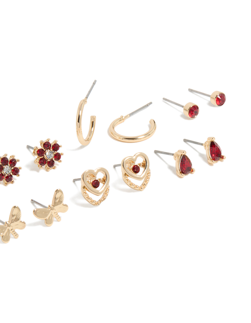 Shop stud earrings in a 7-pack featuring butterfly, floral, heart, and ball accents with gold finish and red diamante details post detail view