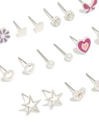 Explore this silver earrings 12-pack featuring heart, star, bow, and floral designs with pearl accents, enamel material, and stud closure close up view - link has visual effect only