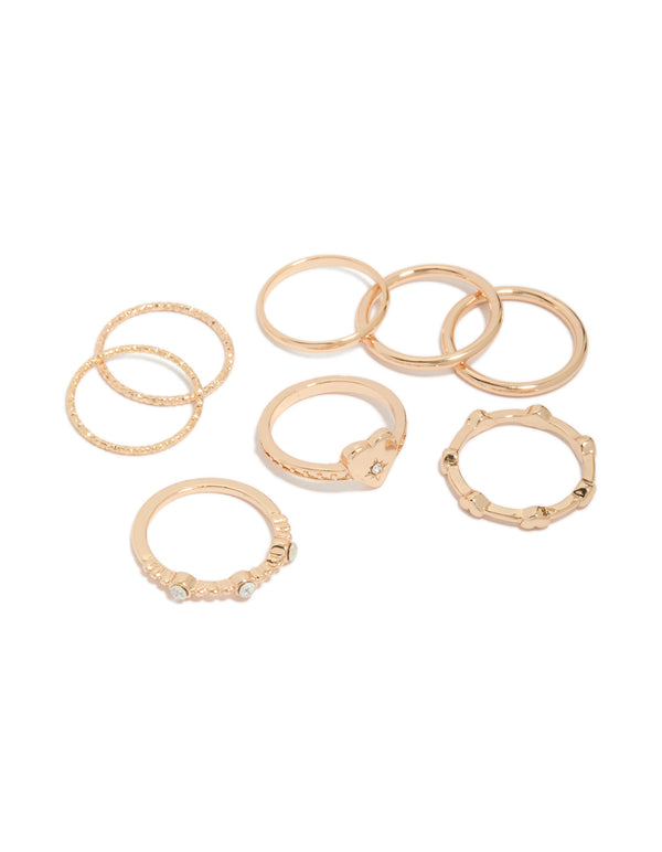 Showcasing a gold heart and diamante band rings 8-pack front view