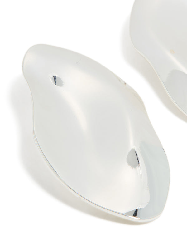 Designed with silver plated organic wrapped large oval earrings in chunky statement style close up view