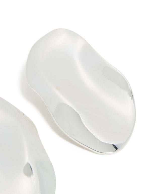 Highlighting silver plated organic wrapped large oval earrings with chunky statement design post detail view