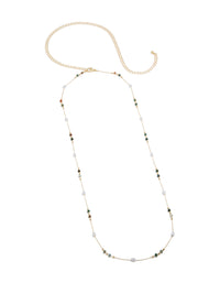 Discover a gold plated waist chain featuring embellished pearl and bead details in multicoloured hues side view - link has visual effect only