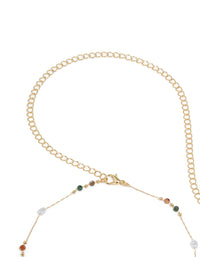 Explore a gold plated waist chain designed with embellished pearl and bead elements showcasing multicoloured stones detail view - link has visual effect only