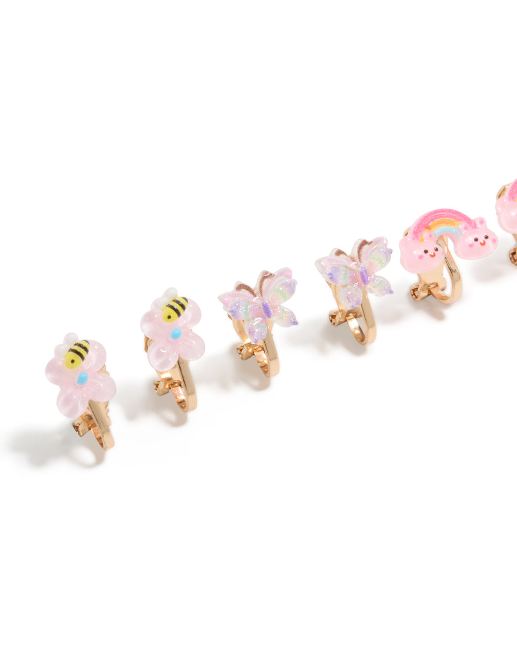 Featuring kids gold garden clip on earrings with celestial, butterfly, floral and glitter elements in pink aqua yellow close up view