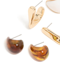 Featuring gold brown and white acrylic stud earrings in a 3 pack close up view - link has visual effect only