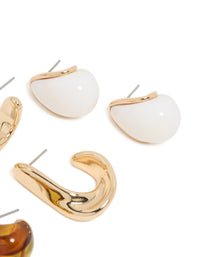 Crafted with gold brown and white acrylic stud earrings in a 3 pack post detail view - link has visual effect only