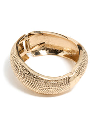 Showcasing a gold dotted boho hinged statement bangle front view - link has visual effect only