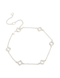 Featuring a sterling silver statement flower charms bracelet in silver front view - link has visual effect only