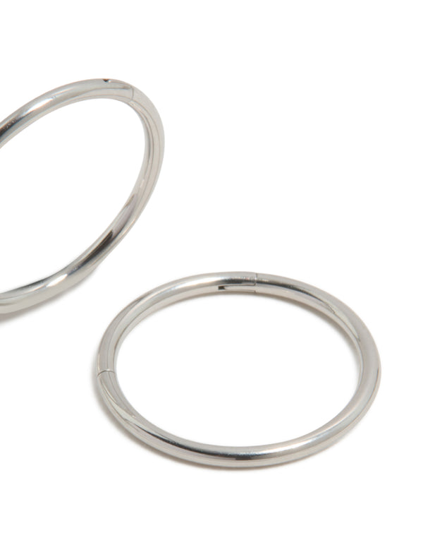 Designed with surgical steel thick sleeper hoop earrings in chunky style, silver finish and 12 MM size post detail view