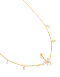 Featuring gold plated surgical steel cubic zirconia pavé bow chain belly bar with charm detail view - link has visual effect only