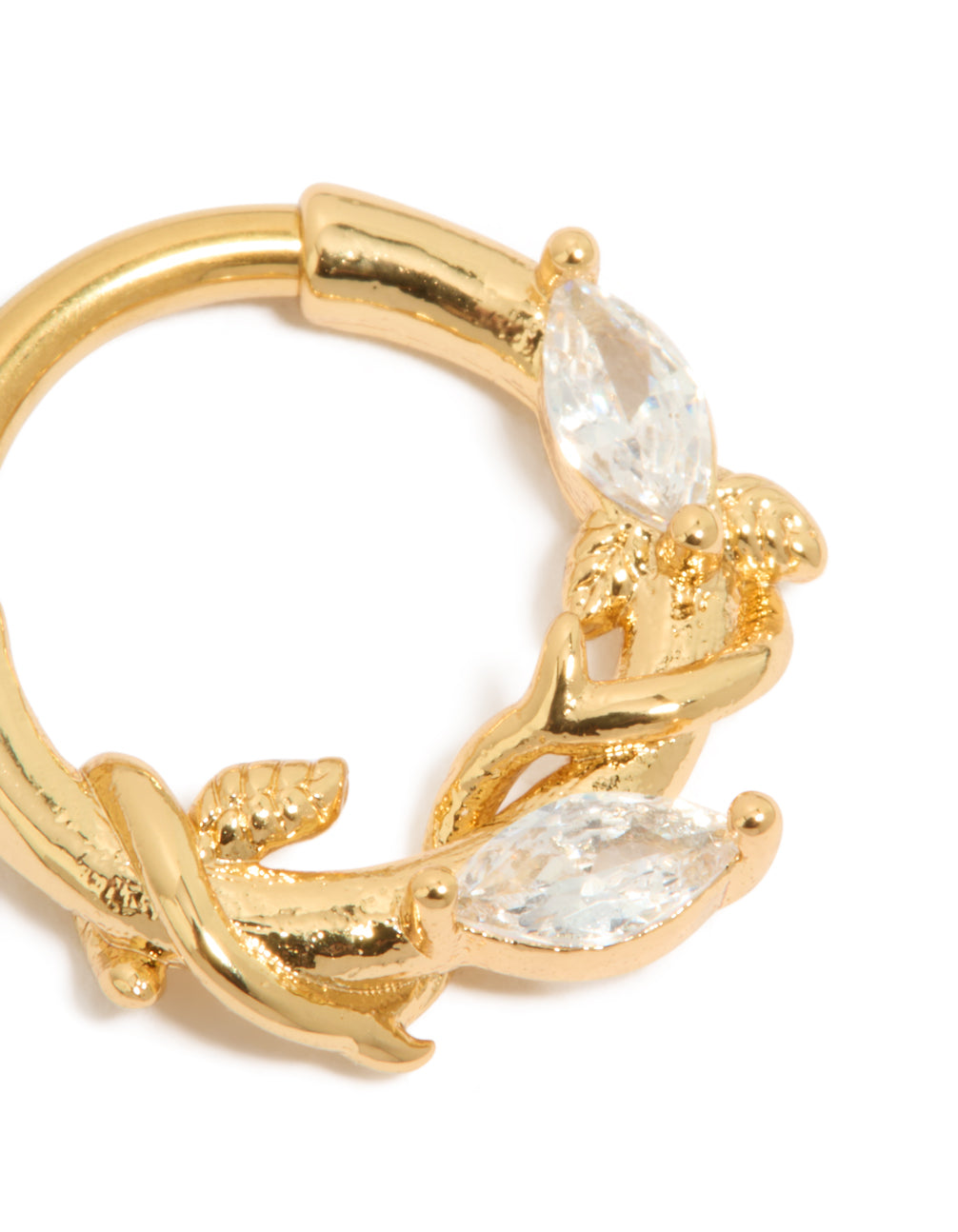 Featuring gold plated titanium clicker ring with leaf design and cubic zirconia stones detail view