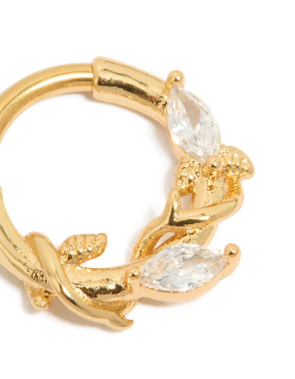 Featuring gold plated titanium clicker ring with leaf design and cubic zirconia stones detail view