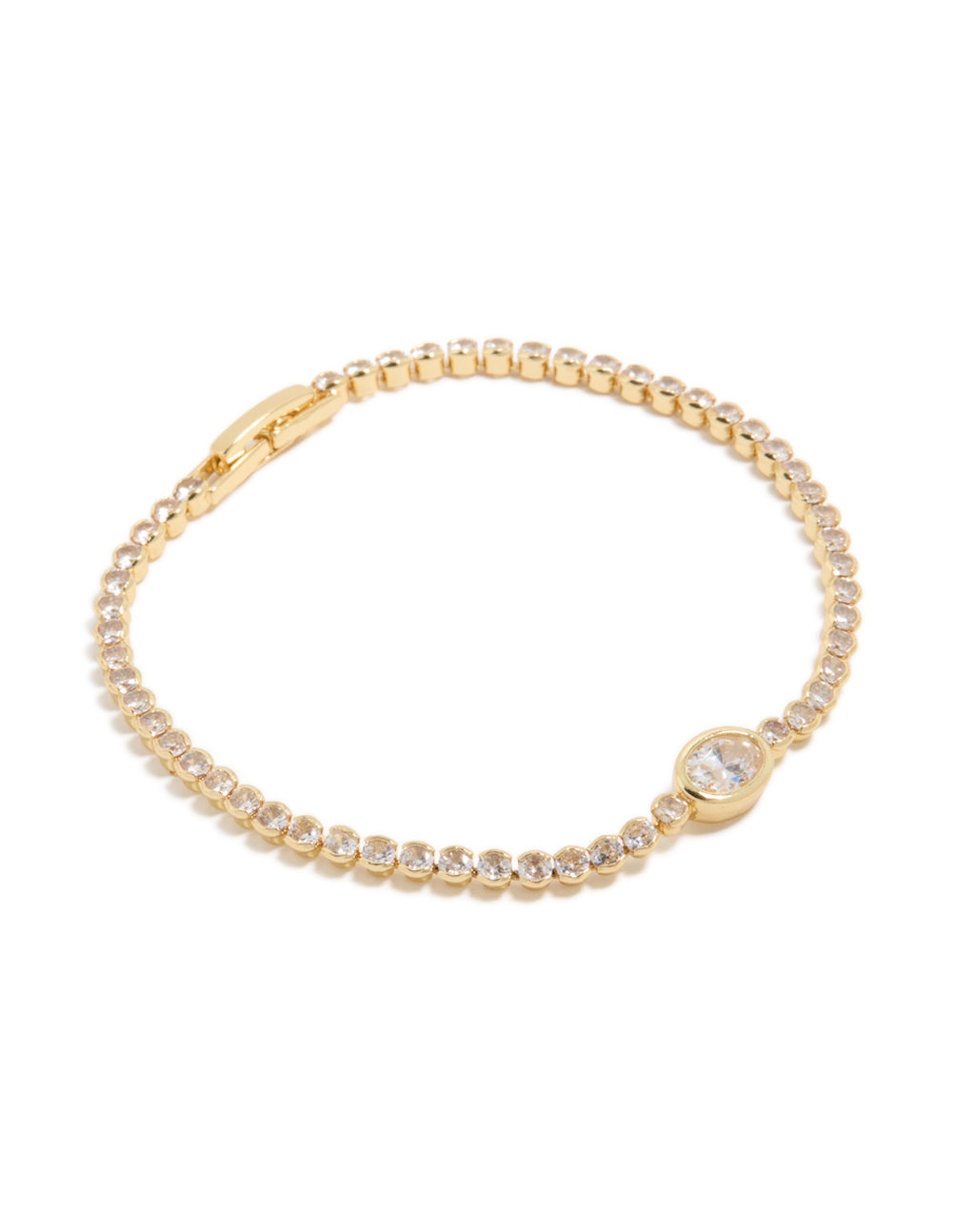 Showcasing a gold plated cubic zirconia oval tennis bracelet with clear stones front view