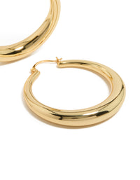 Highlighting gold plated thick thin hoop earrings with closure post detail view - link has visual effect only