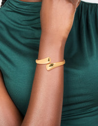Stylish gold plated flat teardrop hinged bangle worn on wrist view - link has visual effect only