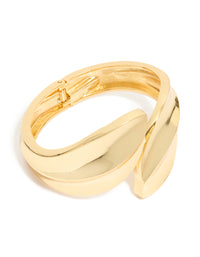 Showcasing gold plated thick curved bangle in statement style front view - link has visual effect only